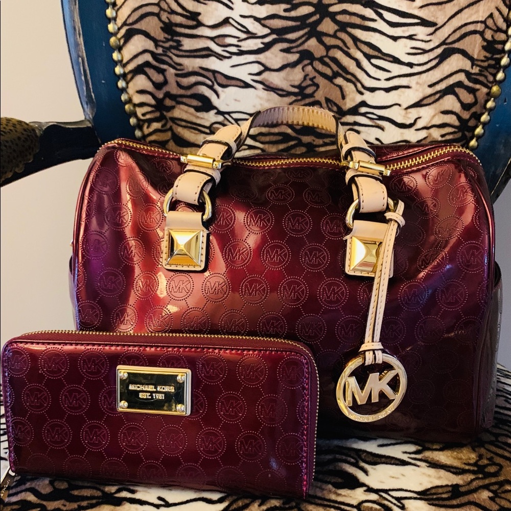 Oxblood Michael Kors handbag and wallet
